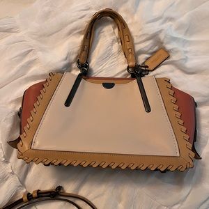 Coach “Dreamer” in color-block with Whipstitch